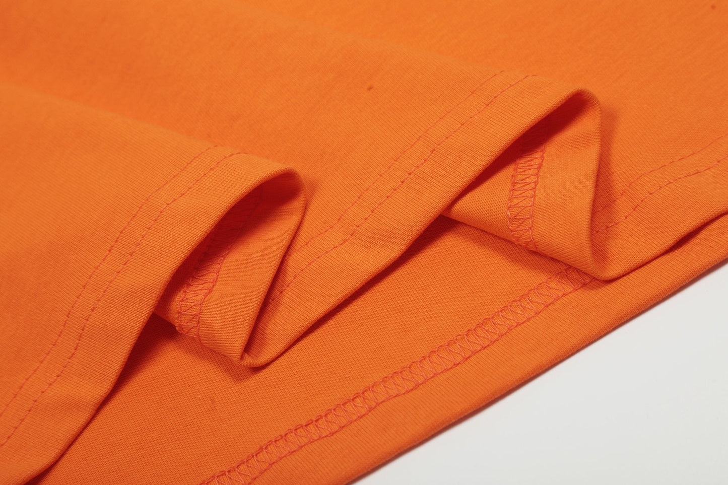 Sp5der Orange Star Graphic T-Shirt — detail