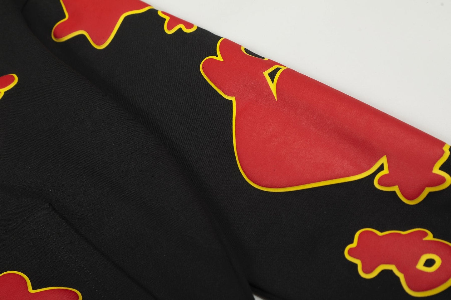 Sp5der Red & Yellow Graphic Hoodie — detail