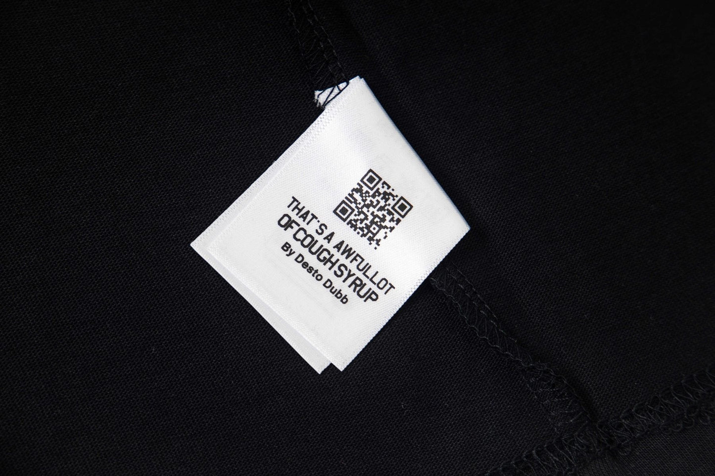 THAT'S A AWFUL LOT OF COUGH SYRUP Red/White Graphic Short-Sleeve T-Shirt — neck_label