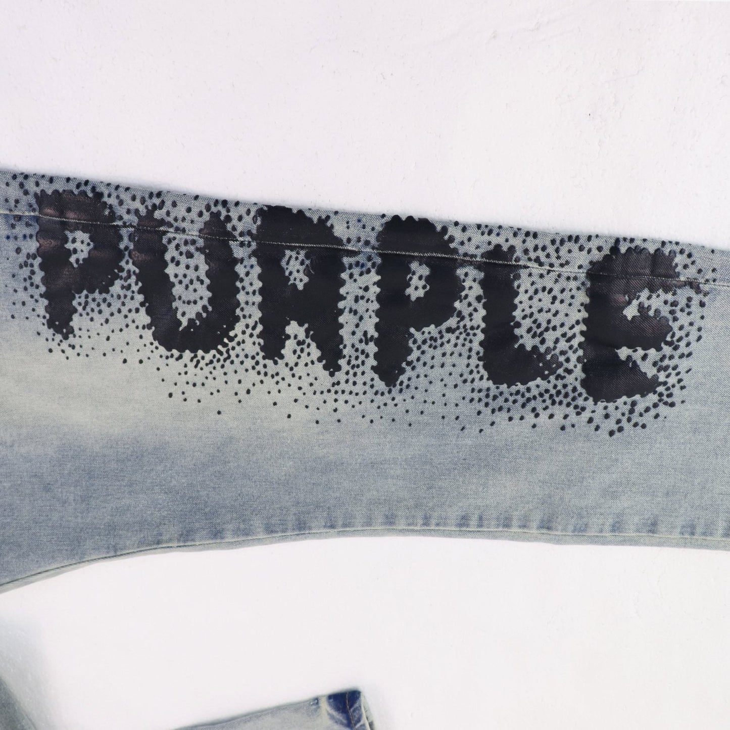 Purple Brand Light Blue Washed Graphic Jeans — detail