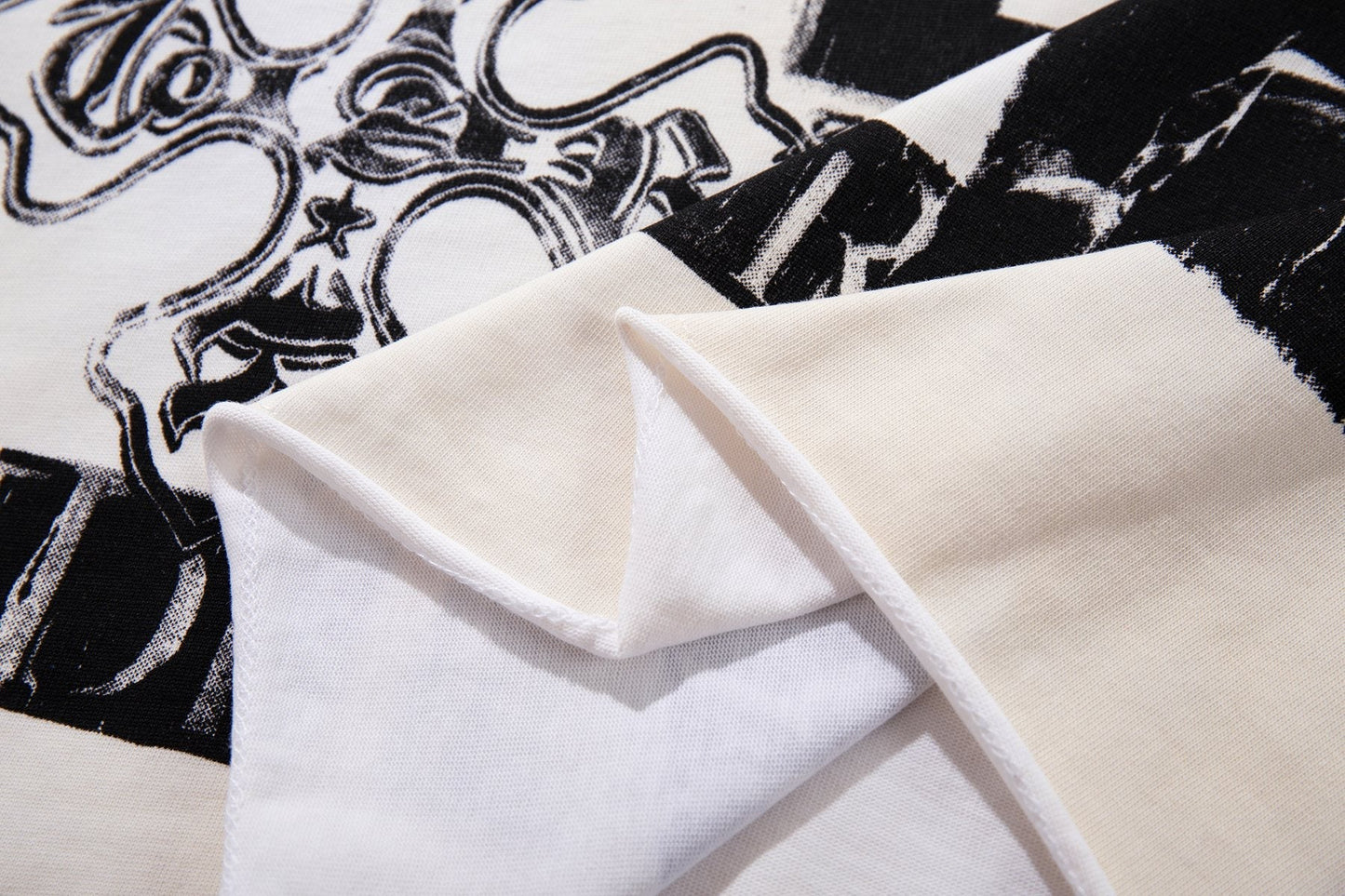MAJESTIK Distressed Rhinestone Graphic T-Shirt — fabric_closeup