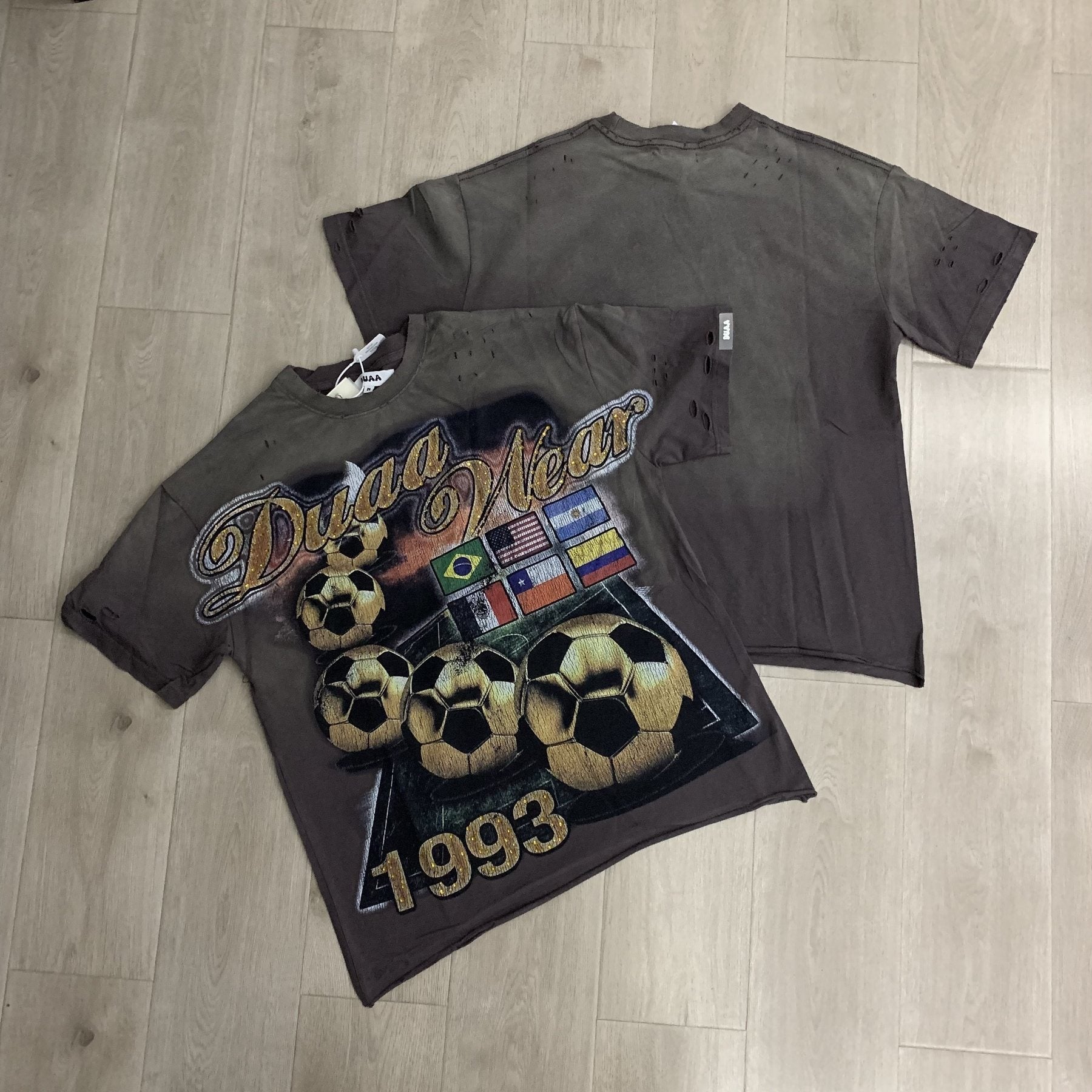 DUAA WC 93 Soccer Flag Distressed Graphic T-Shirt — context